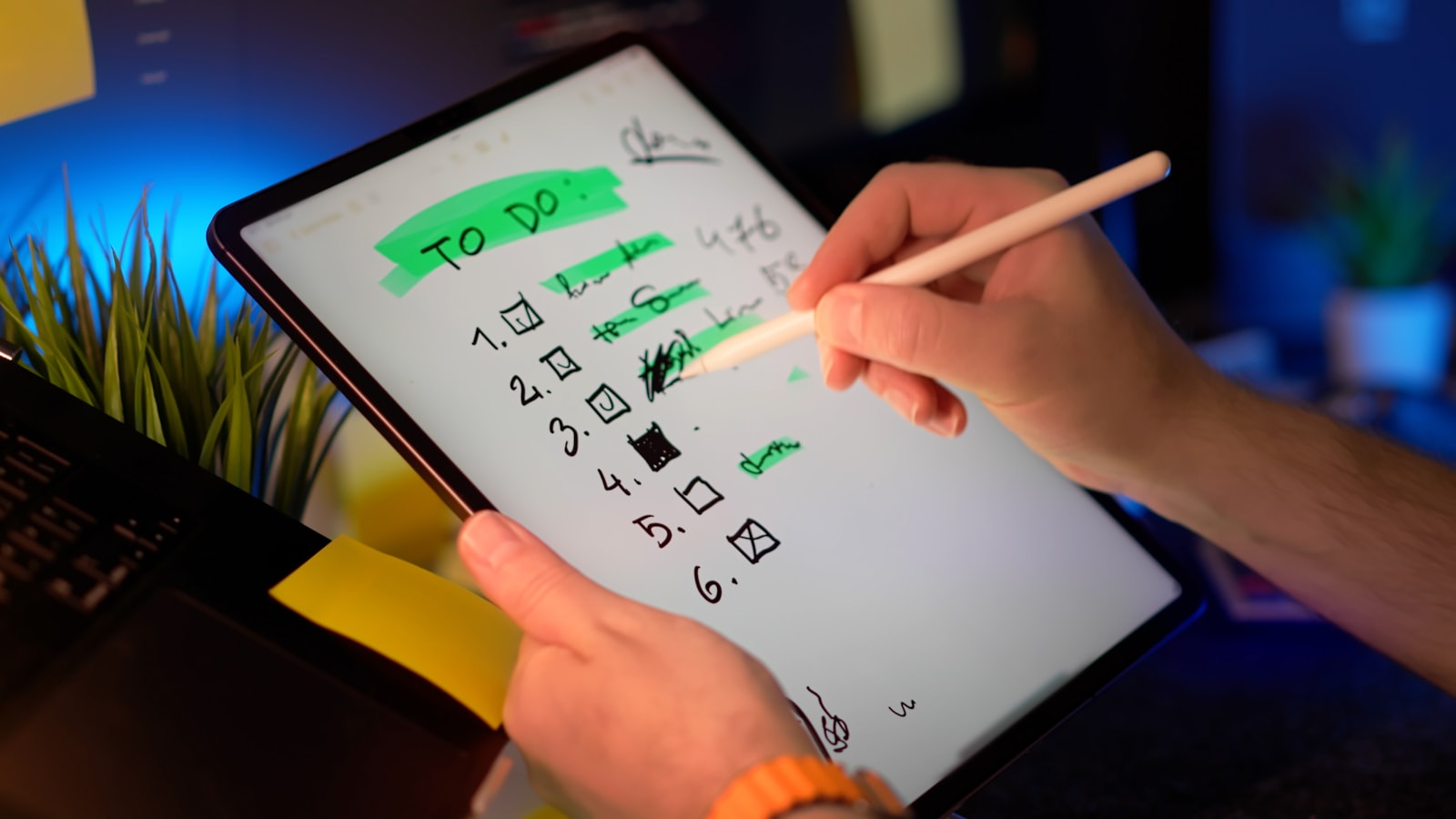 A person using a white stylus to check items on a colorful digital checklist